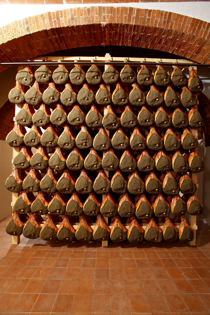 Traditional wooden shelves for prosciutto