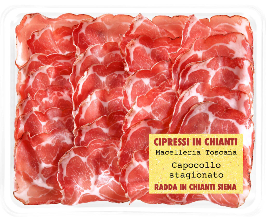 Traditional Tuscany capocollo aged in natural cellars and slice in tray