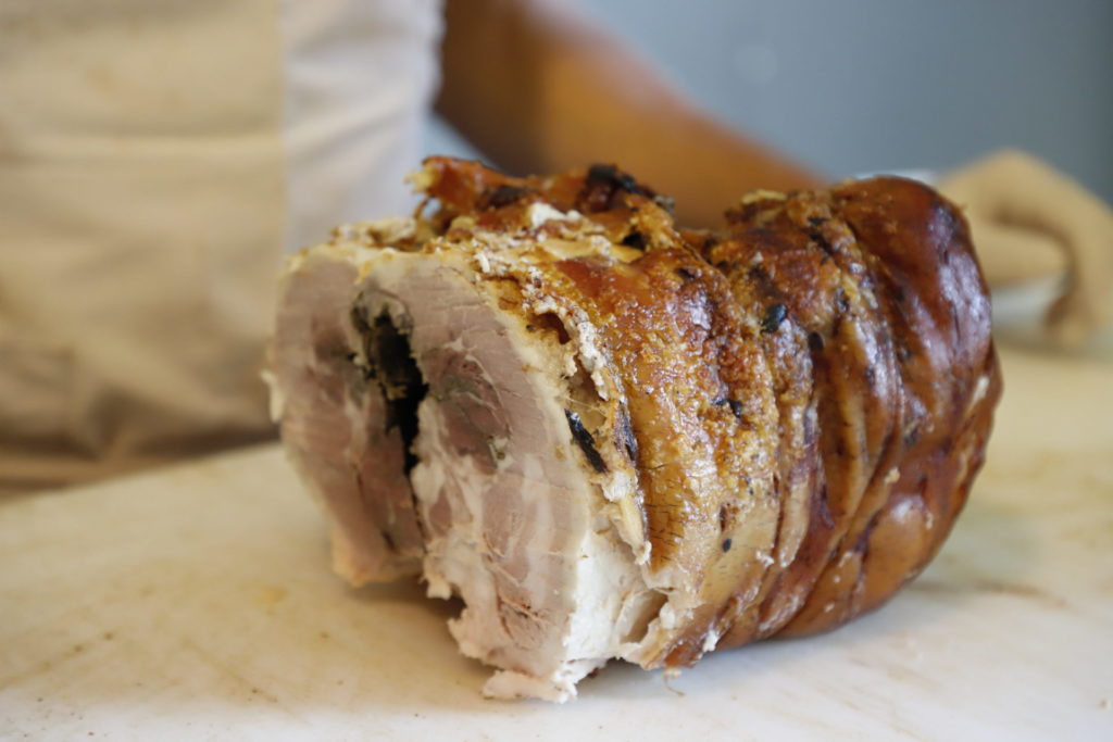 Tuscan porchetta oven cooked with traditional recipe